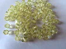 72 Swarovski Bicone Beads in 5mm Jonquil. #5301
