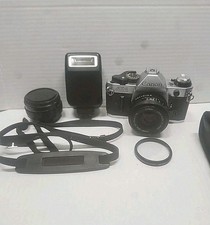 Canon AE-1 Program 35mm SLR Film Camera with 50mm f 1.8 lens Speedlite 200 Works