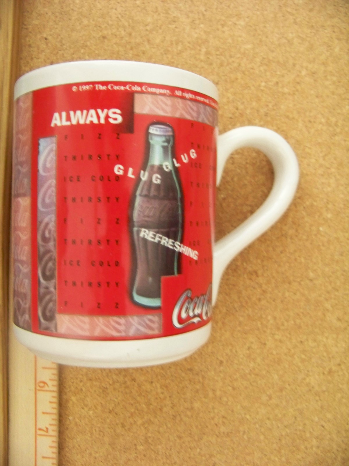 Coca-Cola ceramic coffee mug with classic logo design