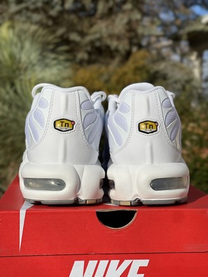 white nike air max with red tick