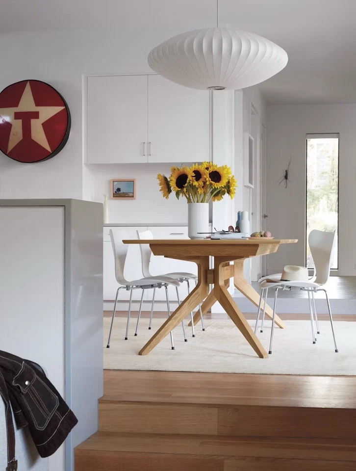 Mesa de comedor con extensión de cruz negra por diseño a su alcance Foto 4 de 4