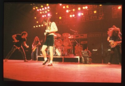 AC/DC Angus Young playing guitar in Concert Vintage Photo Agency ...