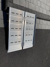 Folding portable wheelchair ramp