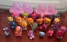 Hatchimals CollEGGtibles Lot Of 24 with 2 Egg Cases Glitter, Royal, Mermal Magic
