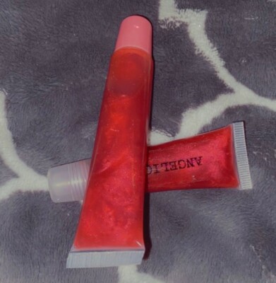 Ruby rose lipgloss with sizes of 10mL,15mL and red pigment by Angeliquecosmetics