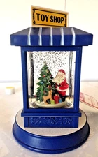 Santa's Toy Shop Square Snow Globe Decorating Tree Colorful Glitter Holiday Time