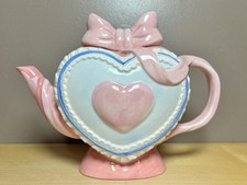 Tetera vintage Lillian Vernon en forma de corazón arco coqueta San Valentín rosa niña