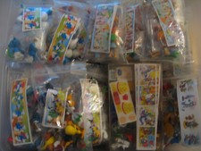 SERIE  COMPLETE  COMPONIBILI  PUFFI-LOONEY TUNES-TOM E JERRY-ORSO YOGHI  KINDER