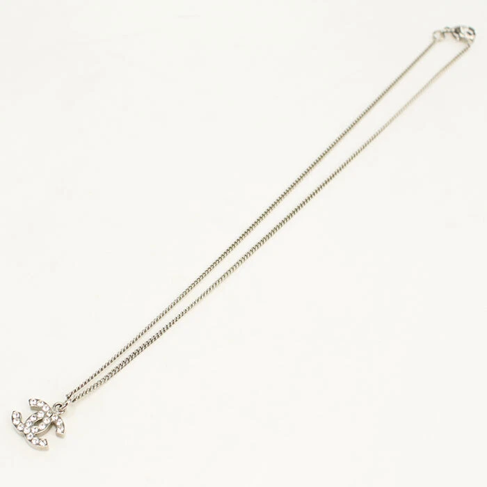 Collana CHANEL CH91240 con strass marchio COCO metallo argento donna