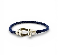 FRED , force 10 , grand modèle , bracelet en or blanc et cordon couleur bleu