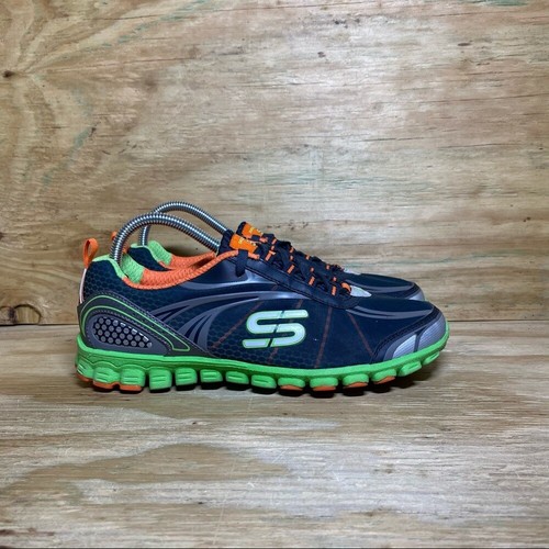 navy blue and lime green nike shoes