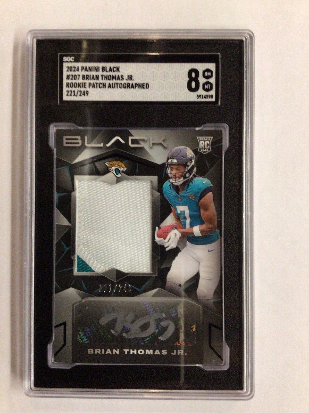 2024 Panini Black - Rookie Patch Autograph Brian Thomas Jr. /249 (AU, MEM, RC)
