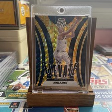 Nikola Jokic 2024-25 Panini Mosaic Elevate Yellow Reactive Prizm #20 Nuggets /99