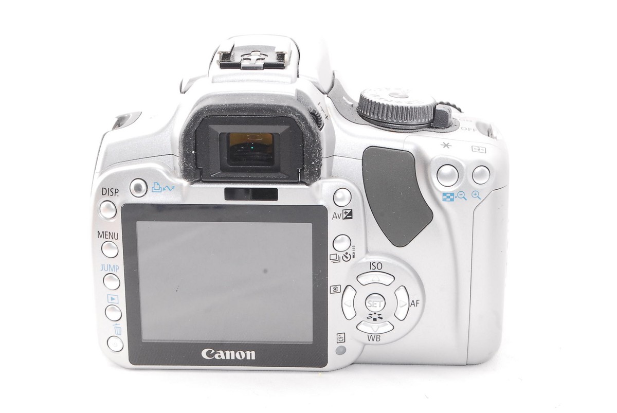 7911) Canon EOS Kiss Digital X 10.1 MP DSLR EFS 18-55mm Lens from