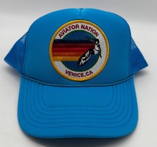 Aviator Nation neon blue adjustable trucker hat with surfer logo