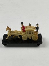 Miniature Plastic Stagecoach with Driver and Horse on Stand