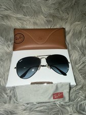 Ray-Ban Aviator Sunglasses with Gold Frame and Dark Blue Lens
