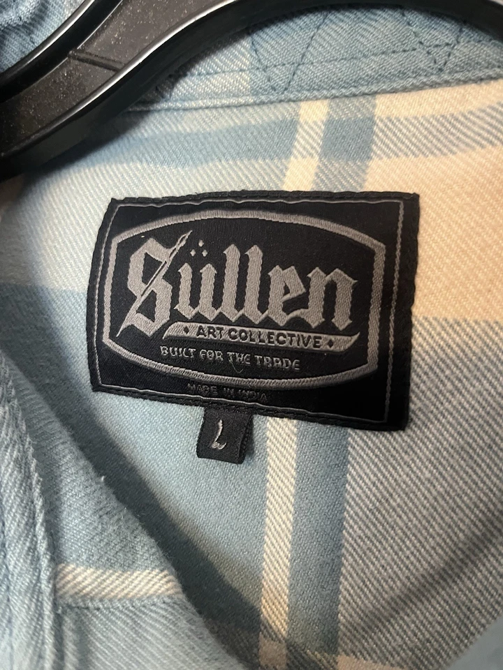 Franela a cuadros azul claro colectiva arte hosco moderno Y2K Foto 2 de 4