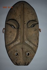 RARE INUIT TRANSFORMATION SHAMANS MASK, seal head at bottom, 14", 1900S