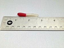 100 1 3/4” Red / White Crappie Tubes and 60 small rubber bobber stops 