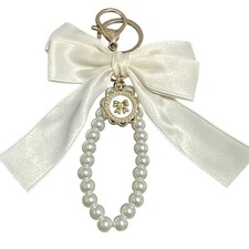 Ivory color Bow with pearls Bag charm or use as a key chain. Brand New