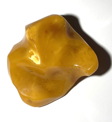 Rare Natural Baltic Amber Stone   60 g with a natural hole in it