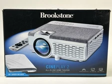 Brookstone All-In-One Home Theater Projector in White