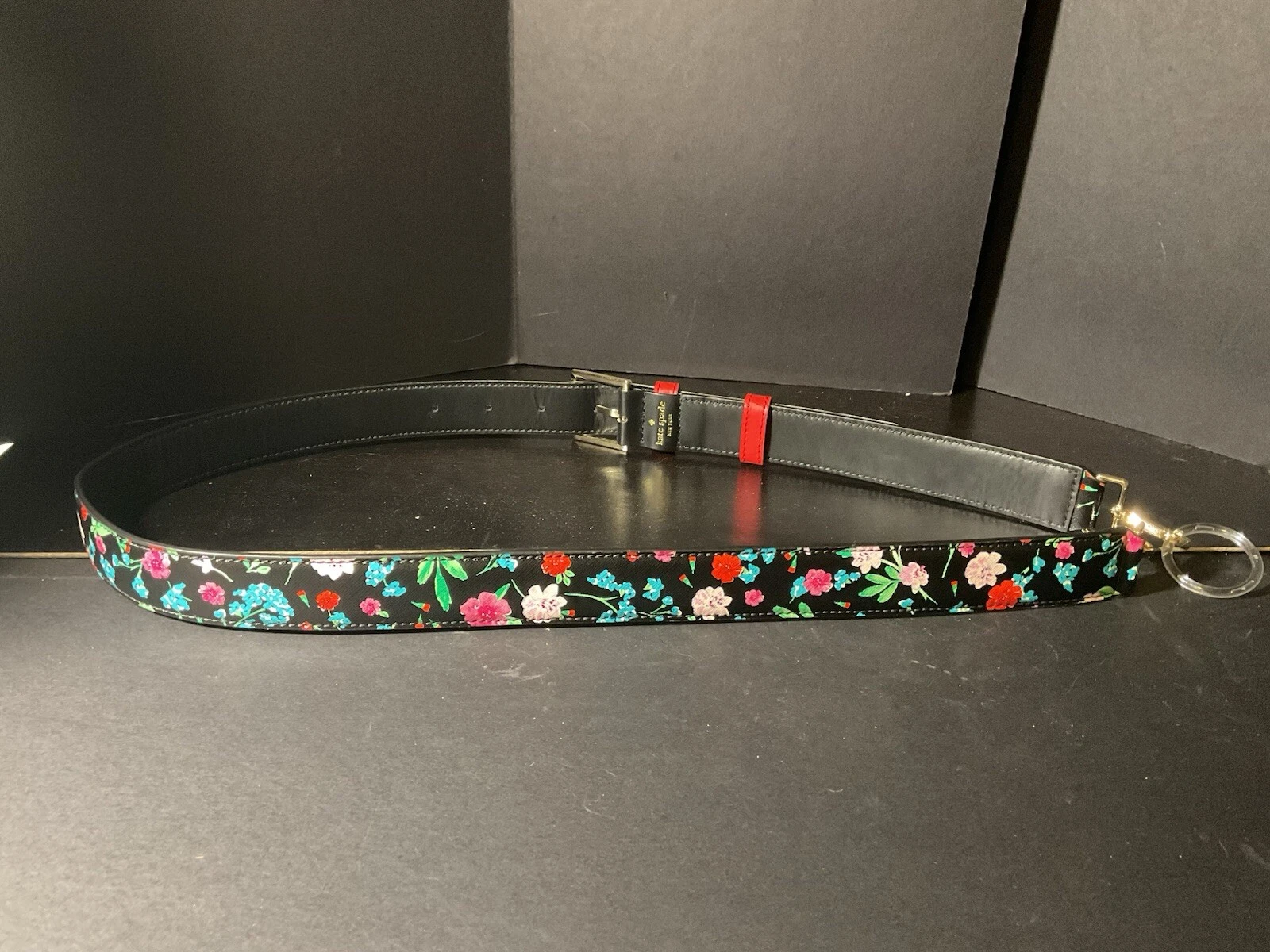 Tracolla di ricambio Kate Spade in pelle nera floreale L48” x W1”
