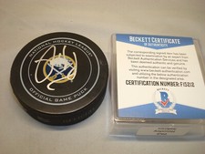 Phil Housley Signed Buffalo Sabres Official Game Hockey Puck Beckett BAS COA 1B