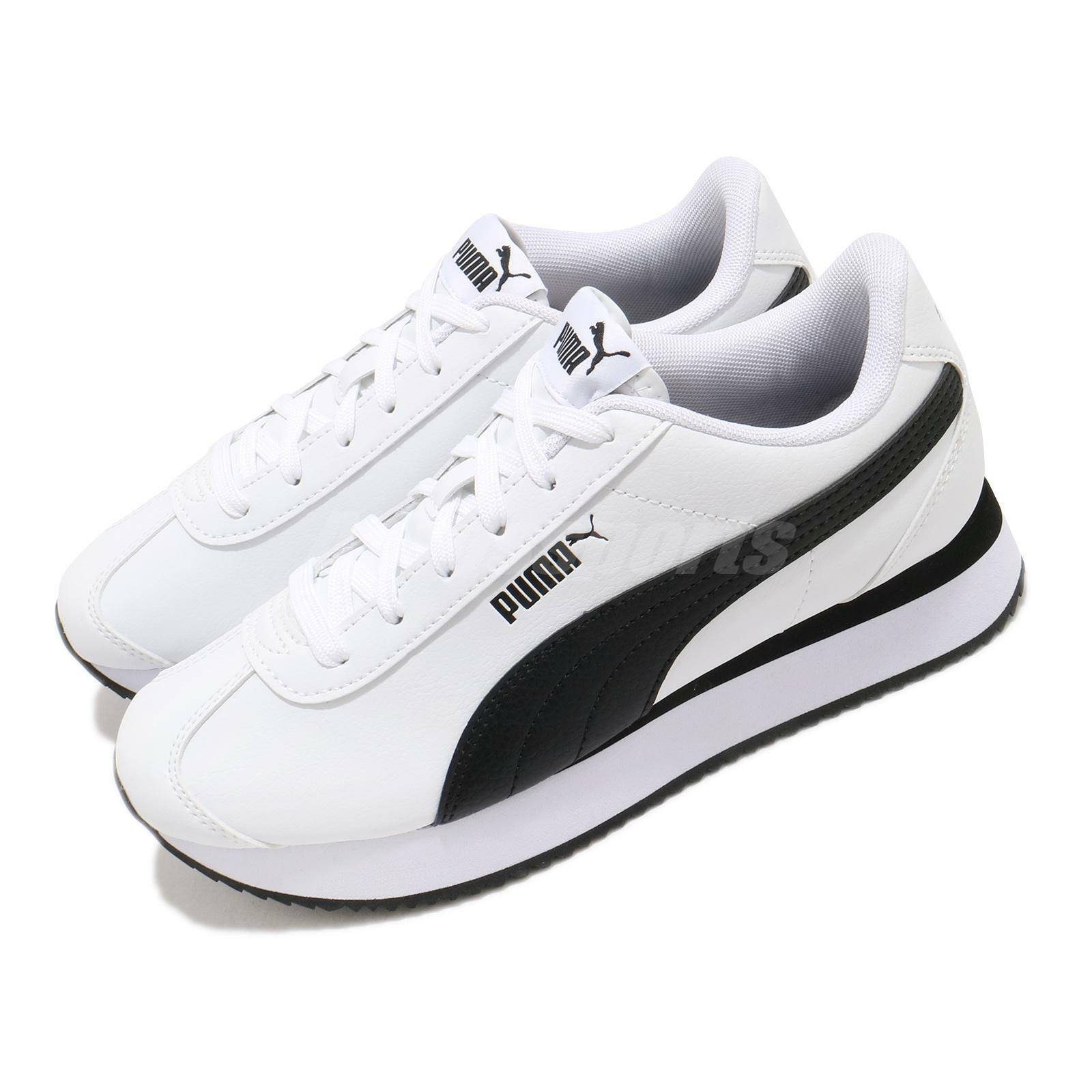 stacked tennis shoes