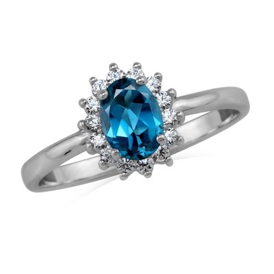 Silvershake Petite 7X5mm Genuine Oval Shape London Blue Topaz White Gold Plat...