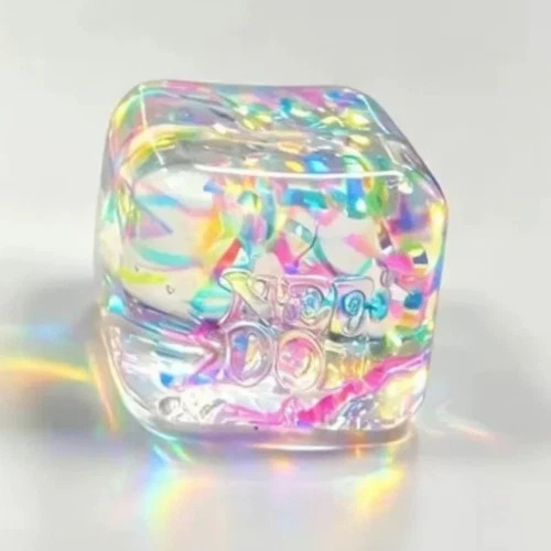 Product photo 2 of 4 — Needoh Nice Cube holographic ribbon confetti fidget toy