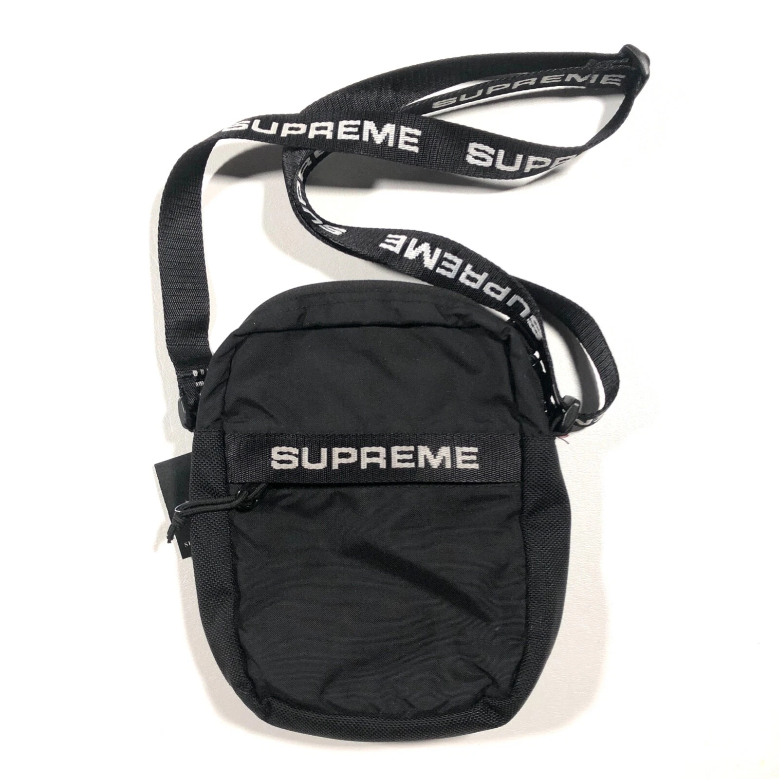 Sac bandoulière SS20 Supreme Spellout noir sangle réglable streetwear