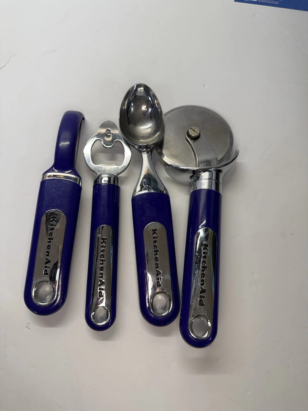 Kitchenaid™ Stainless Steel Deluxe Pizza Cutter, Ice Cream Scoop, Purple Set
Opens in a new window o