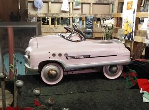 pink cadillac pedal car