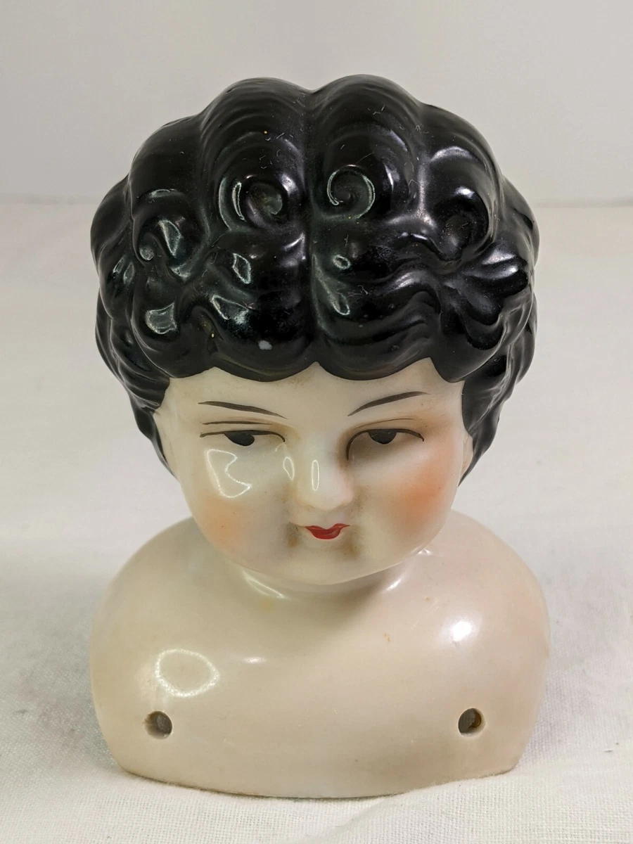 Antique porcelain hotsell doll heads value
