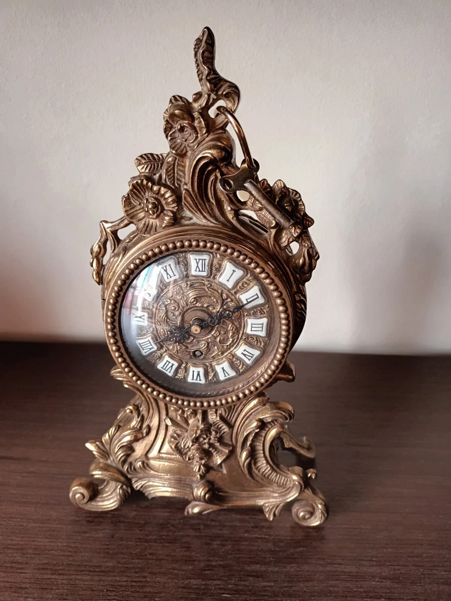 Orologio da tavolo in bronzo ed ottone stile antico 900