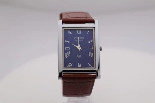Vintage Seiko Slim Quartz Blue Dial Men's Wrist Watch with Light Brown Strap