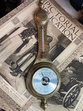 Vintage Daymaster Banjo style barometer housed in a solid brass case.
