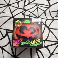 Nee Doh Jack-Glow Lantern Glow-in-the-Dark Squeeze Toy, Orange/Black