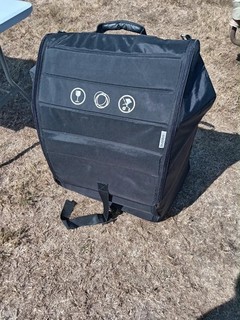 Bugaboo comfort transport bag. Black with red lining.. Very good condition.
