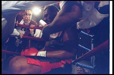 Oliver McCall sits in his corner at a bout v Lennox Lewis at the L- Old Photo