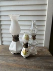 vintage miniature milk glass/clear Patterned  oil lamps. Set Of 3