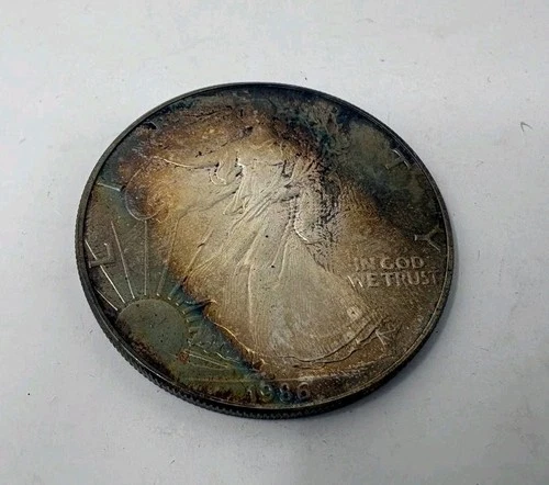 Untouched  Toned  1986 American Silver Eagle 1 Troy Oz .999 Fine Silver