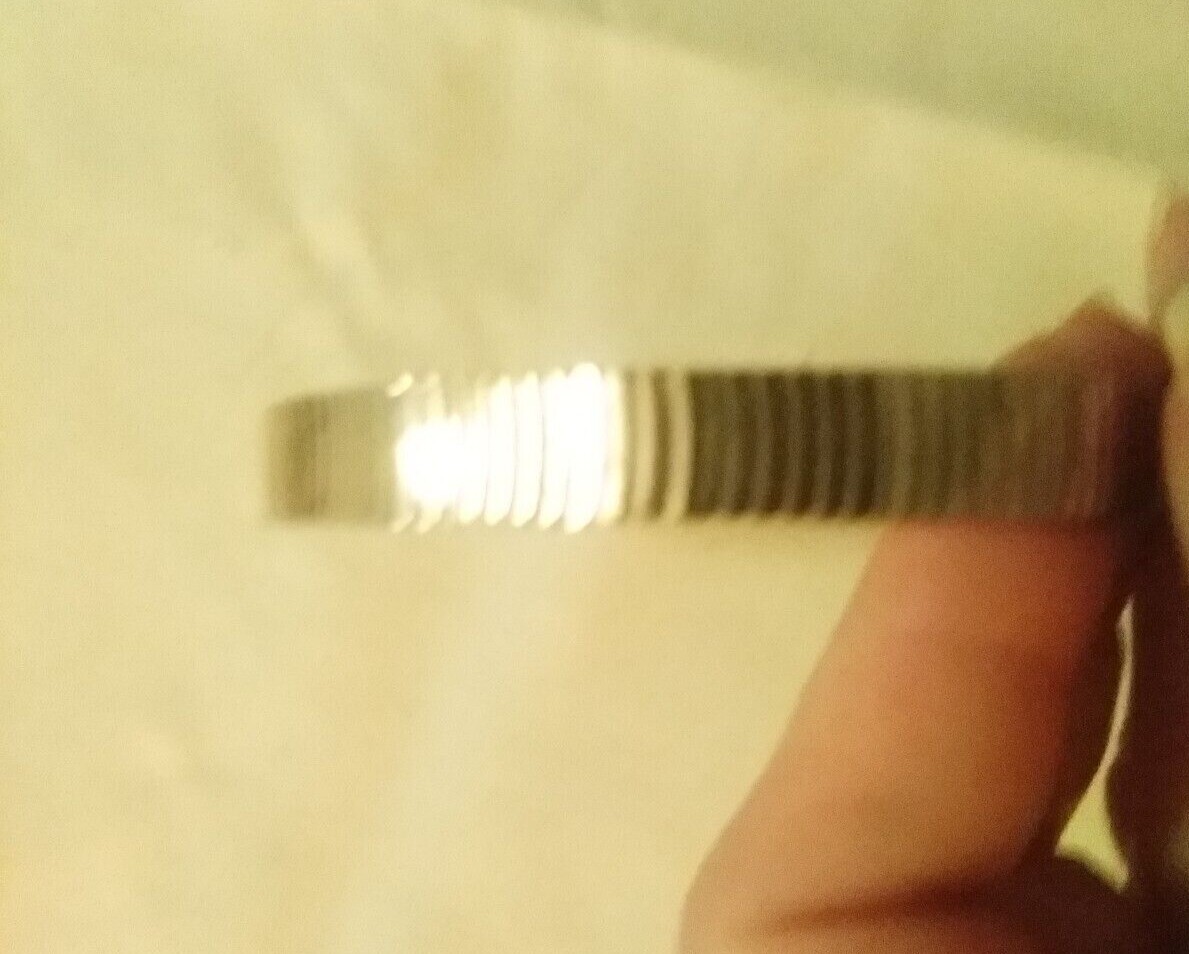 Silvertone womens wave pattern bangle bracelet - image 1