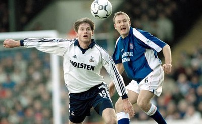 Willem Korsten of Tottenham Hotspur is closed down by Mark Venus o- Old Photo