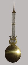 BALANCIER HORLOGE COMTOISE LENTILLE LYRE ø27.5CM POIDS : 1100 grammes