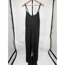 Vuori Lux Jogger Jumpsuit Black V Neck Built In Bra Pockets Athleisure