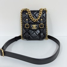 Chanel Black Quilted Aged Gold Hardware Vertical Mini Flap Crossbody Bag