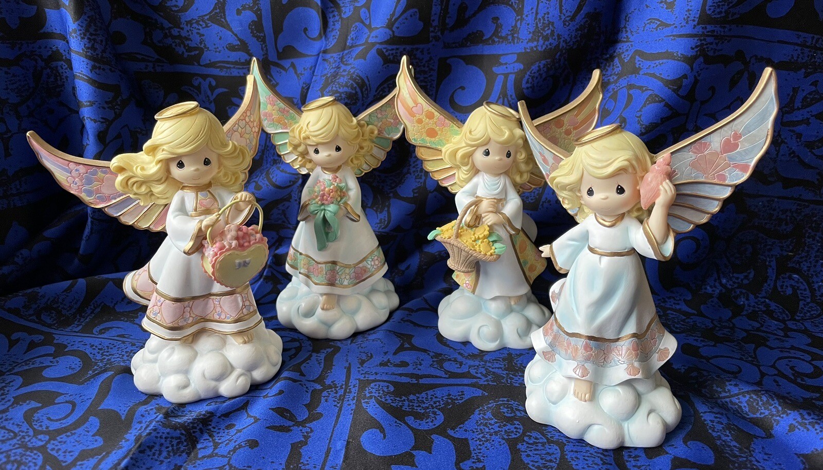 Set of four Precious Moments "On Heaven's Wings" Angel figurines eBay